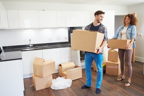 Professional movers loading household items for a Balham relocation