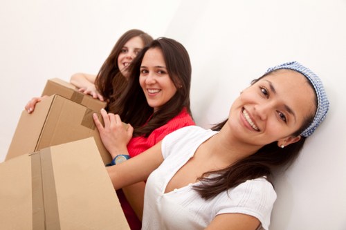 Local team collecting sofas and tables from a Balham home
