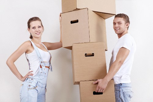 Professional movers unloading furniture at a Balham property