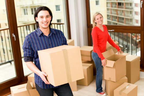 Packed boxes and furniture in a Balham flat removal